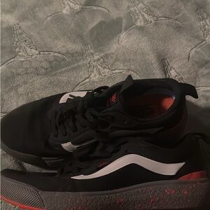 Vans Black and White Sneakers with Red Accents